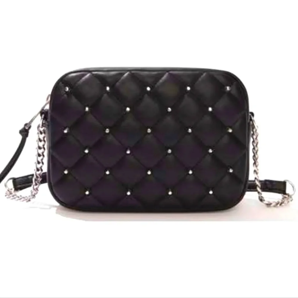 Rebecca Minkoff• Mini quilted studded black crossbody bag. 7.25” x 2.25” x 5.25”